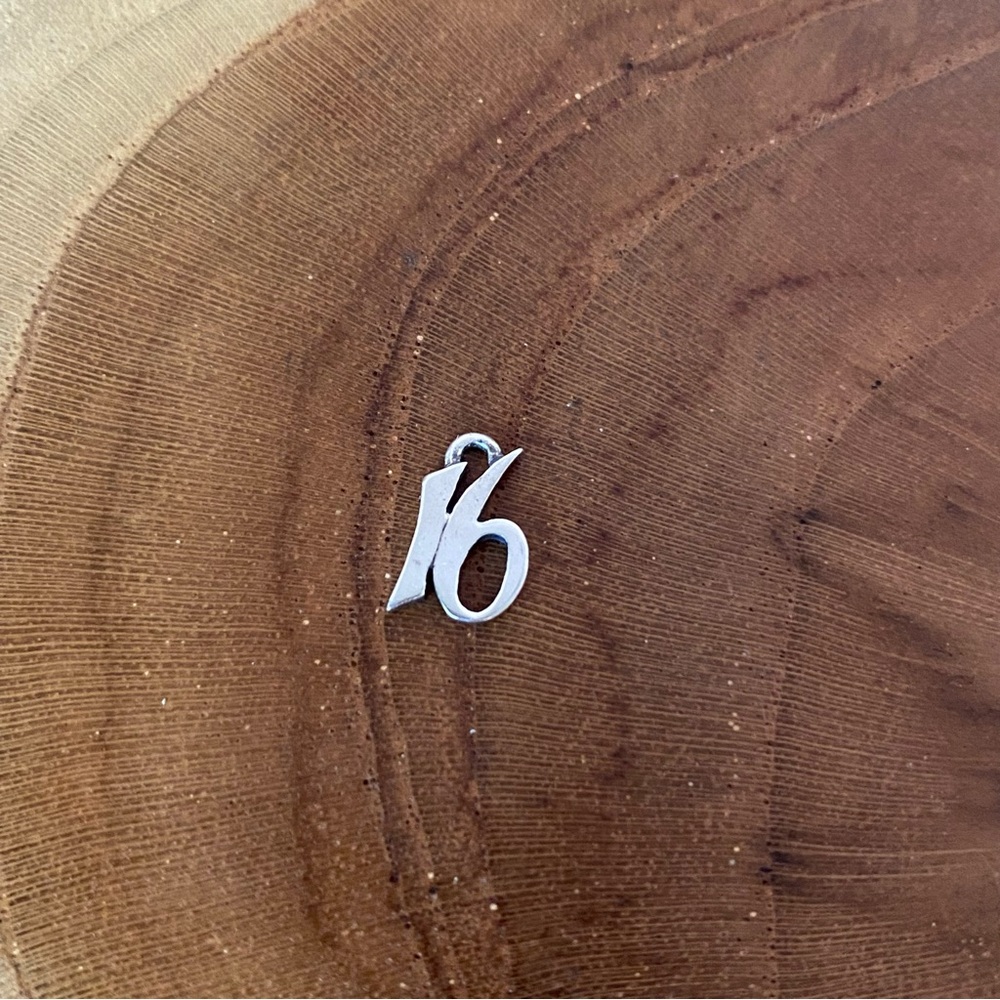 RETIRED James Avery 16 Italics Charm, Sterling Silver